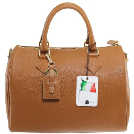 Sac mode femme en cuir italien porté épaule avec bandoulière amovible sac bowling cognac