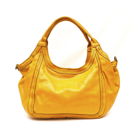 Sac hobo très tendance femme en cuir italien vintage porté épaule jaune moutarde