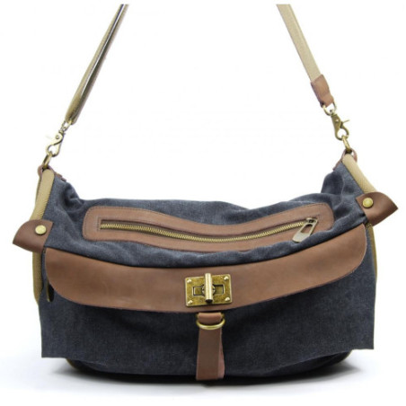 Sac mode femme en cuir et toile porté épaule avec bandoulière noir sac week-end tendance