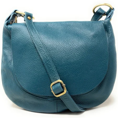 Sac très tendance femme en cuir grainé porté épaule de travers et bandoulière bleu canard