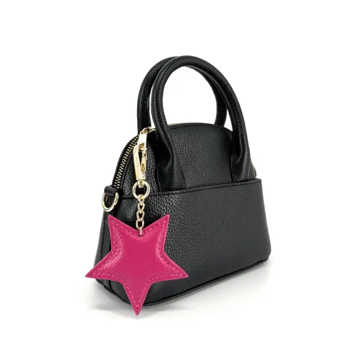porte clé bijou de sac en cuir grainé fuchsia forme étoile tendance